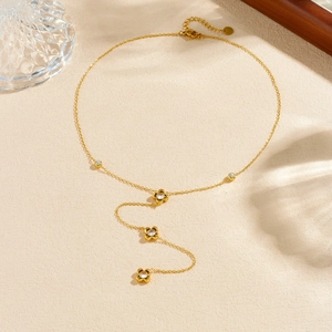 Elegant gold-plated Y-shaped tassel necklace featuring hollow flower pendants with crystals
