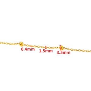 Detail of golden stainless steel beaded cross chain with 1.5mm width and 3.5mm beads