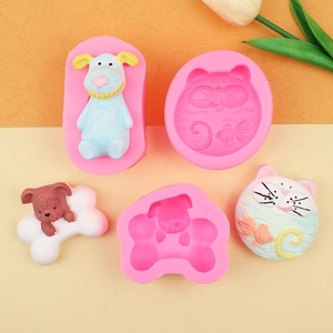 Pink silicone DIY molds featuring cute dog, cat, and fish bone shapes for resin crafts