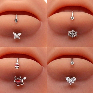 Detailed views of stainless steel navel rings featuring butterfly, snowflake and heart shapes
