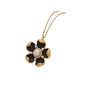 Golden flower pendant necklace with black petals and faux pearl centers for women