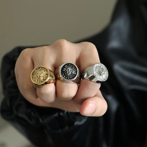 Men's bold lion head engraved rings in gold, silver, and vintage black finishes