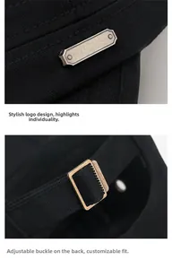 Detail of adjustable metal buckle and fashion logo plate on black cotton flat top cap