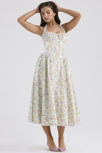 Detail shot of summer floral maxi dress featuring halter neckline and corset-style waist