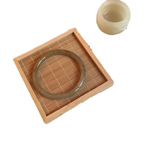 Elegant translucent grey glass bangle bracelet for women in a traditional Chinese style