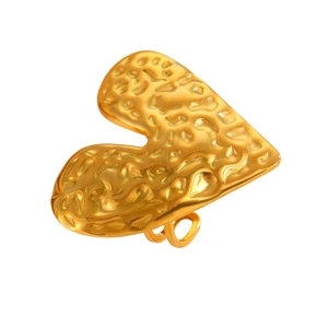 Detailed view of golden heart ring with unique molten lava texture and metallic finish