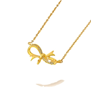 Elegant gold bow necklace with sparkling crystals on a minimalist square tube chain