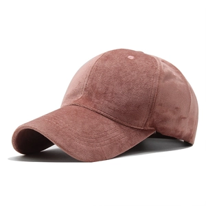 Close-up of velvet texture and premium stitching on a dusty rose baseball cap