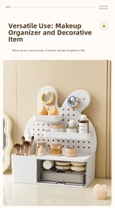 Close-up of white rabbit pegboard organizer with translucent drawers and shelf