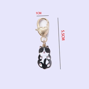 Cute black and white enamel cat keychain with gold heart lobster clasp and 5.5cm total length