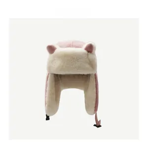 Detail of winter trapper hat with cute bear ears and plush faux fur lining for warmth