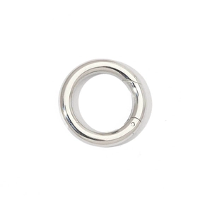 Close-up of a polished silver stainless steel spring ring clasp for jewelry DIY crafts