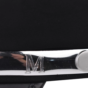 Black baker boy hat with silver metal plate featuring an engraved M logo detail