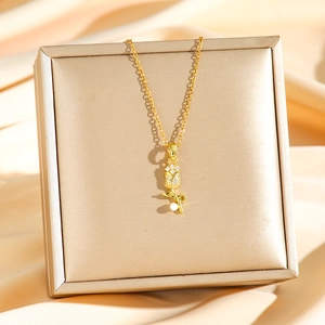 Elegant 18K gold tulip pendant necklace featuring a white pearl and sparkling zircons