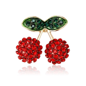 Cute cherry brooch pin with red rhinestones and green enamel leaves in gold finish