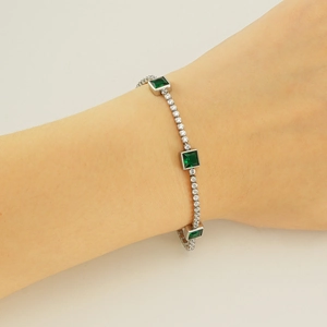French vintage silver tennis bracelet with emerald green stones and zircon accents