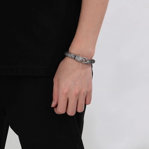 Retro stainless steel snake bracelet for men with detailed silver scale texture