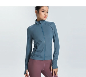 Detail of slim fit sports jacket with stand collar and functional windproof thumbholes