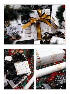 Macro view of Christmas gift wrapping paper with gold star patterns and satin ribbons