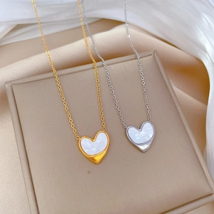 Minimalist heart shell pendant necklaces in gold and silver finish with fine O-chains