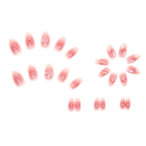 Pink gradient press-on nails with 3D white rose and pearl accents in ballet shape