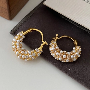 Elegant gold plated hoop earrings with white pearls and sparkling cubic zirconia stones