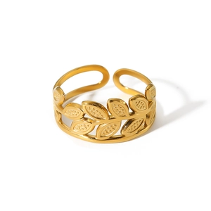 Detailed view of 18k gold plated leaf design stainless steel open ring with zircons