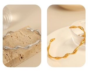 Modern wavy stainless steel bangles in gold and silver finish with minimalist design