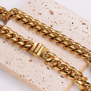 Golden stainless steel Cuban link chain with square clasp on decorative stone