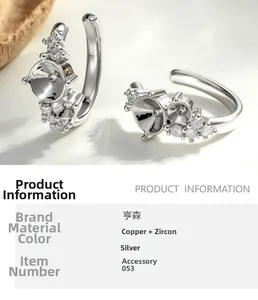 Detailed close-up of 3mm and 5mm silver earring settings with cubic zirconia stones