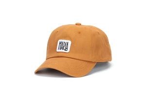 Close-up of cotton baseball cap with MARIA letter embroidery patch and stitched brim