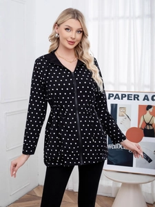 Women's black polka dot hooded jacket with drawstring waist and zip-up front closure