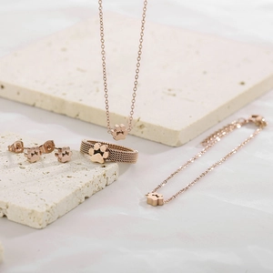 Rose gold mesh cat paw jewelry set including necklace, earrings, bracelet and ring