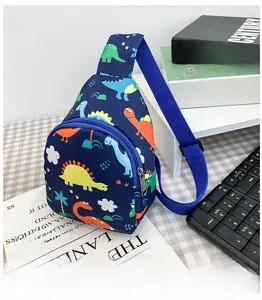 Detail of cute cartoon dinosaur print on a dark blue kids chest bag with adjustable strap