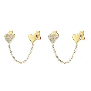 Orecchini a cuore dorati con intarsio in zircone e catena in stile minimalista
