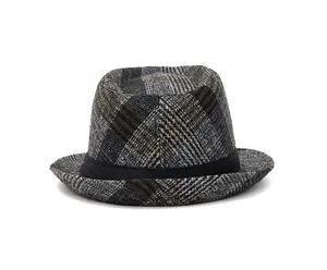 Close-up of the back view of a vintage plaid trilby hat with a black grosgrain ribbon band