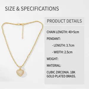 Detailansicht goldener Herzanhänger mit Zirkonia und 40 cm langer gedrehter Kette
