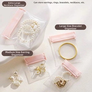 Detailed view of pink zip-lock EVA jewelry bags in multiple sizes for anti-oxidation storage