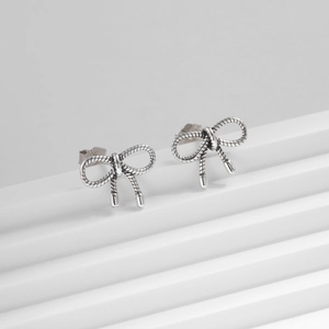 Vintage S925 sterling silver twist bow stud earrings with textured finish and silver beads