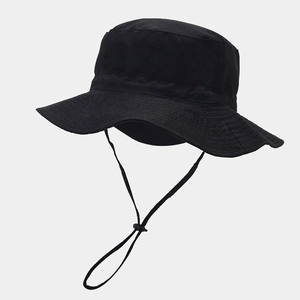 Detail view of black sun hat featuring wide brim and adjustable windproof chin strap