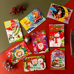 Détail de cartes de Noël 3D avec dorure et motifs de personnages festifs assortis