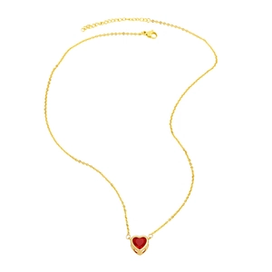 Elegant gold chain necklace with a vibrant red heart-shaped gemstone pendant