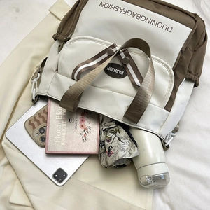 Large capacity canvas tote bag with multi-compartment storage for books and tablet