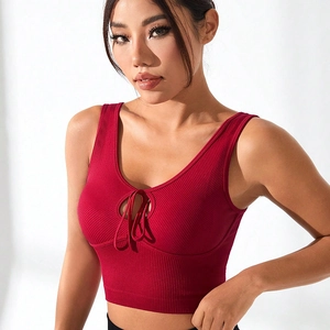Slim fit red ribbed yoga sports bra with deep V-neck and front hollow drawstring detail