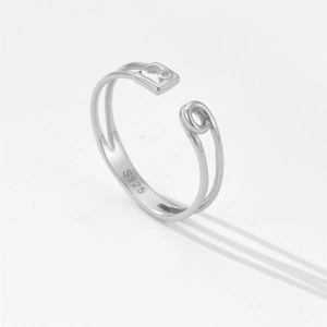 Detail view of S925 sterling silver adjustable ring with unique square and clip design
