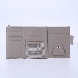 Grey PU leather car sun visor organizer featuring card slots and mesh pocket