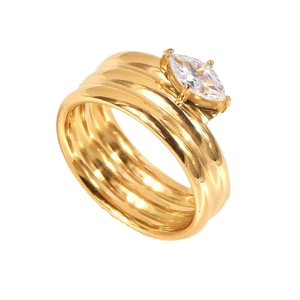 Multi-layer wavy gold titanium steel ring with marquise-cut zircon on white background