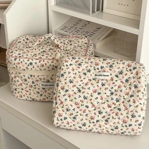 Quilted floral corduroy makeup bag set with top handle and cream flower pattern