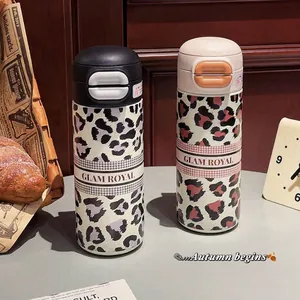 Leopard print stainless steel thermal cup with flip top lid and stylish GLAM ROYAL text