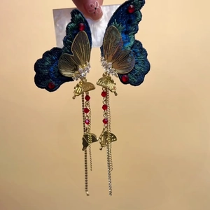 Exquisite embroidered butterfly tassel earrings with blue green wings and gold chains